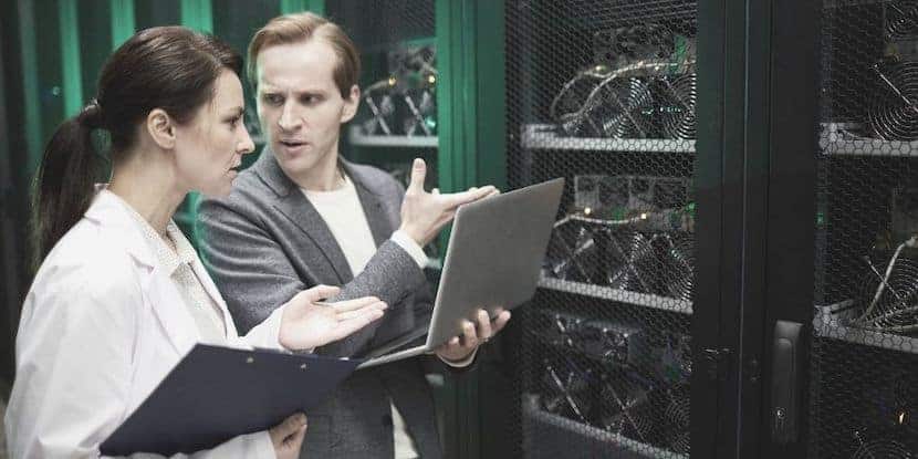 2 people in a colocation data center