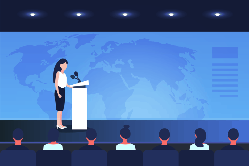 woman giving a speech on stage at security conference